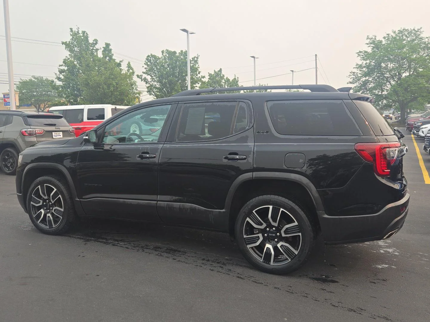 Used 2021 Ebony Twilight Metallic GMC SLE image 4