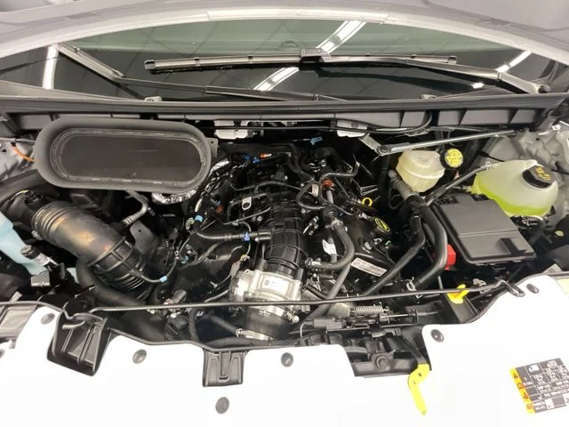 New 2026 Oxford White Ford Passenger Van XLT image 25