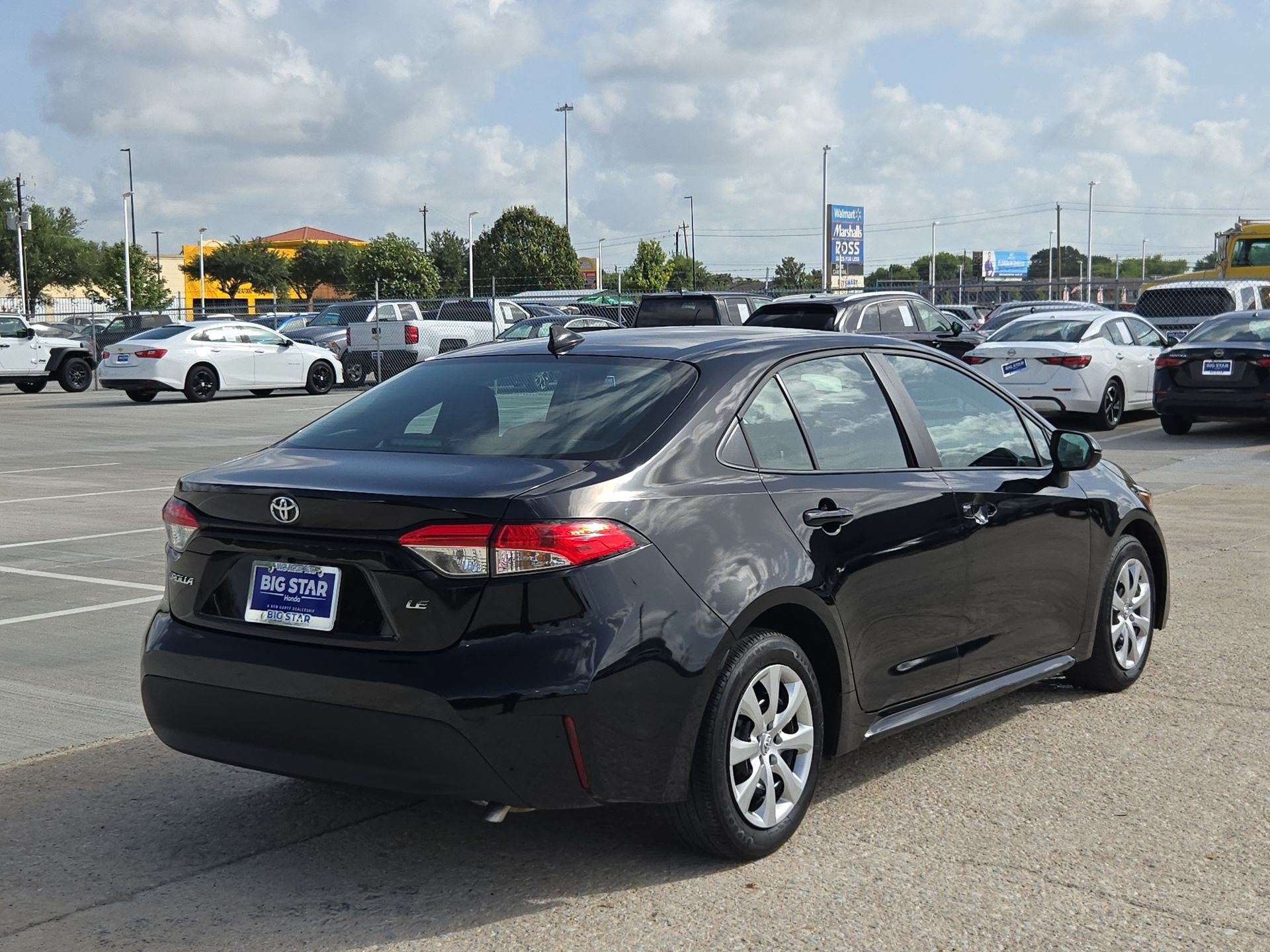 Used 2025 Midnight Black Metallic Toyota LE image 3