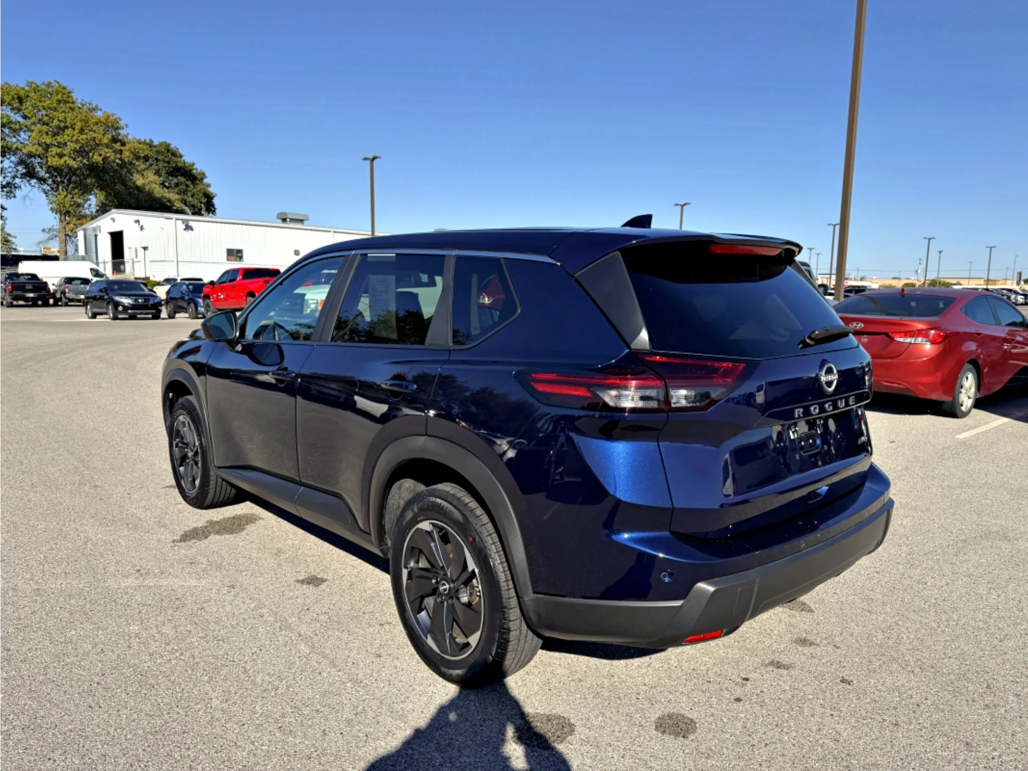 Used 2026 Deep Ocean Blue Pearl Nissan SV image 21