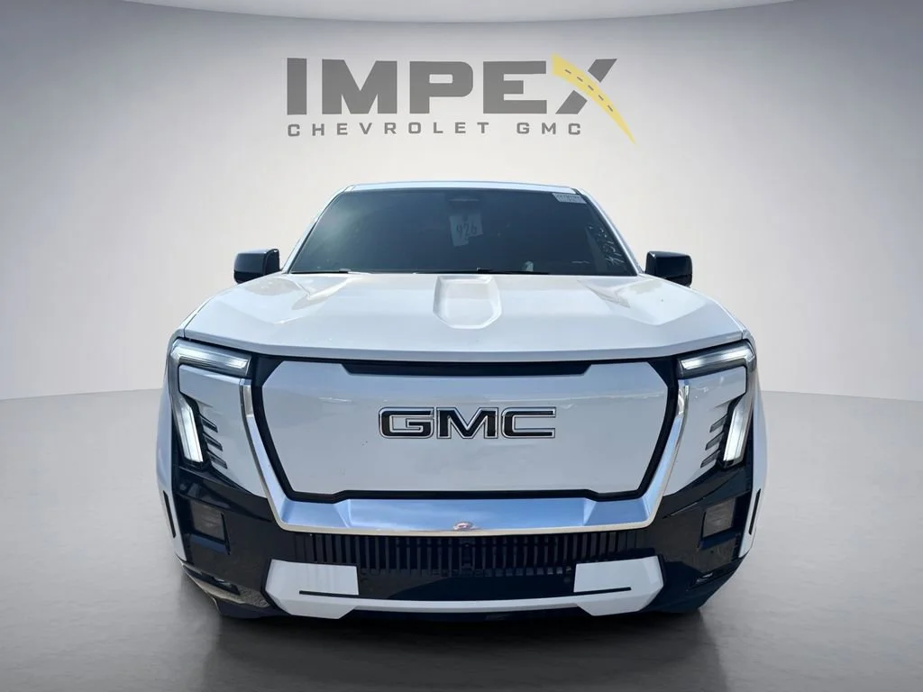 Used 2025 Summit White GMC Max Range Denali image 6
