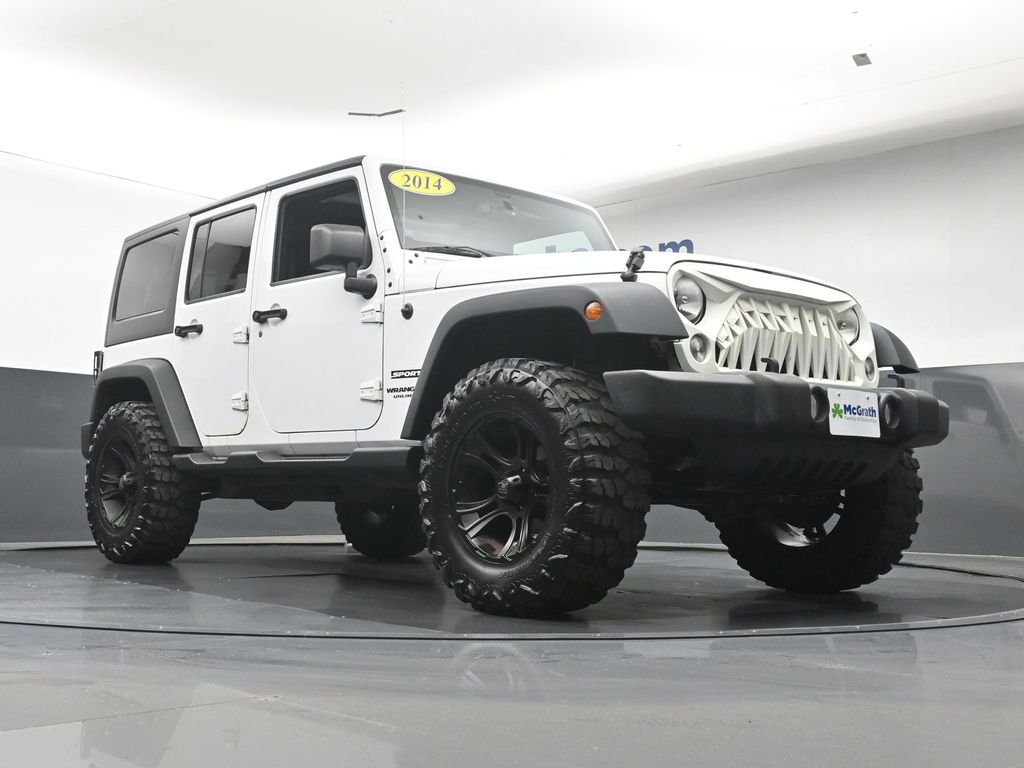 Used 2014 White Jeep Unlimited Sport image 26