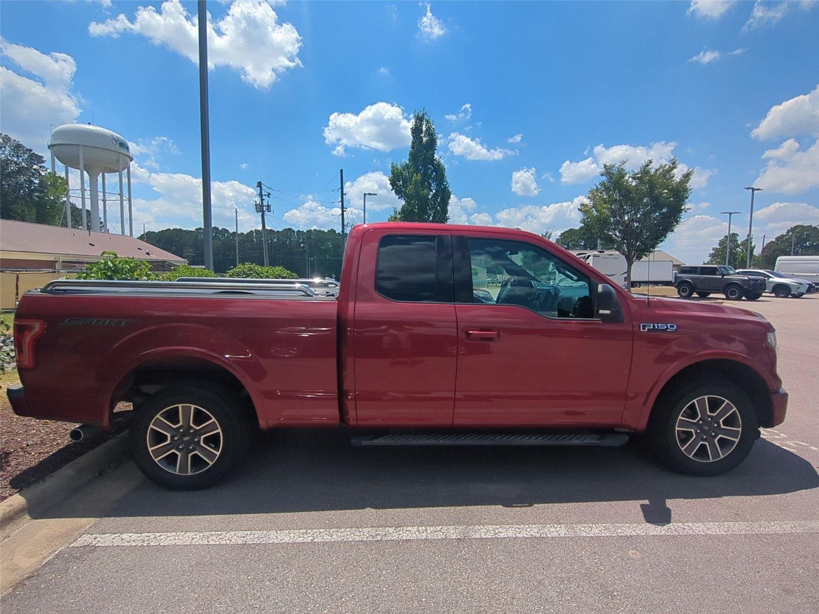 Used 2016 Ruby Red Metallic Tinted Clearcoat FORD  image 4