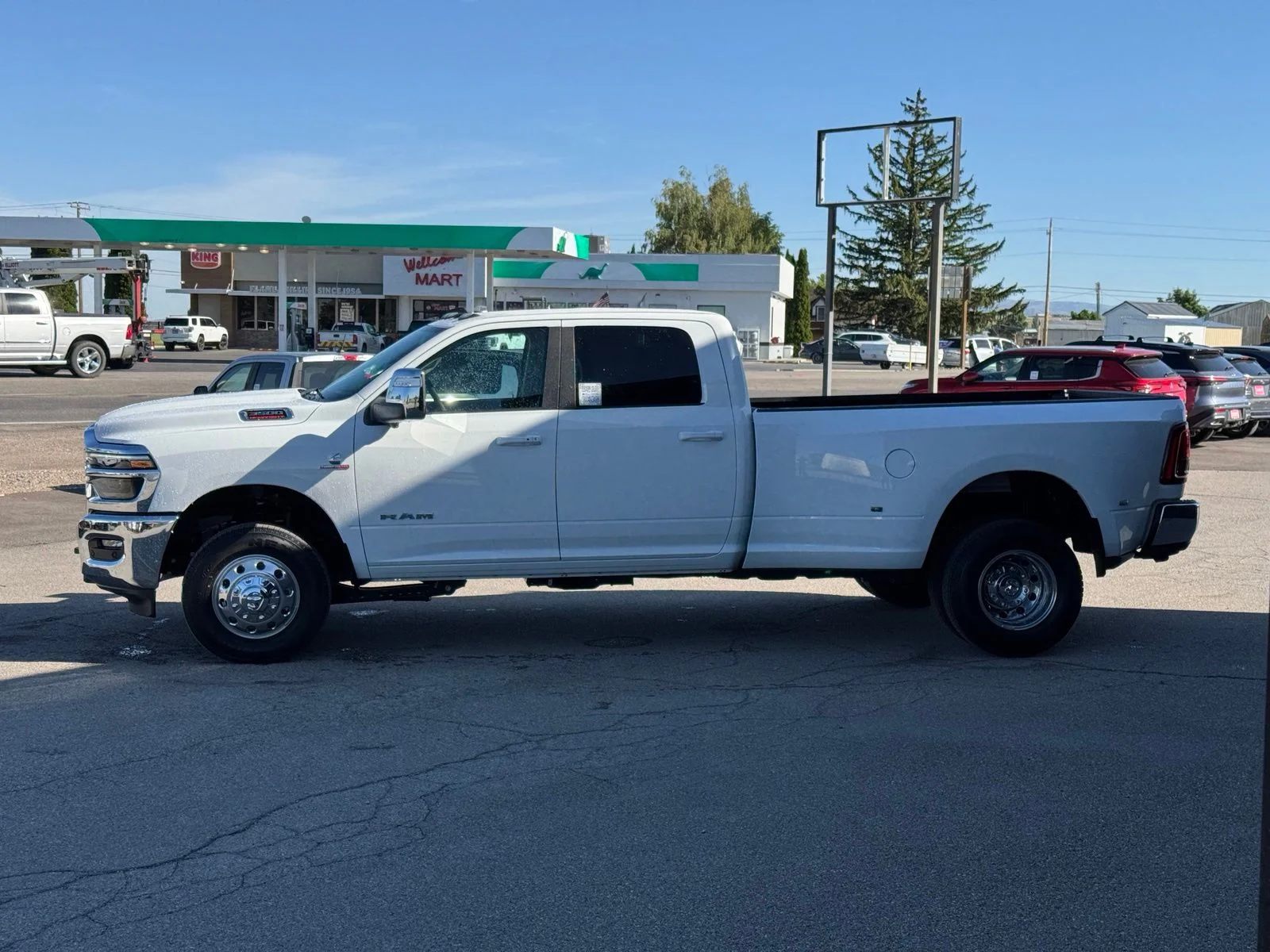 New 2026 Bright White Clear-Coat Exterior Paint RAM Laramie image 11