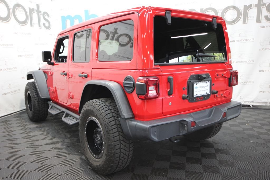 Used 2019 Red Jeep Unlimited Sahara image 4