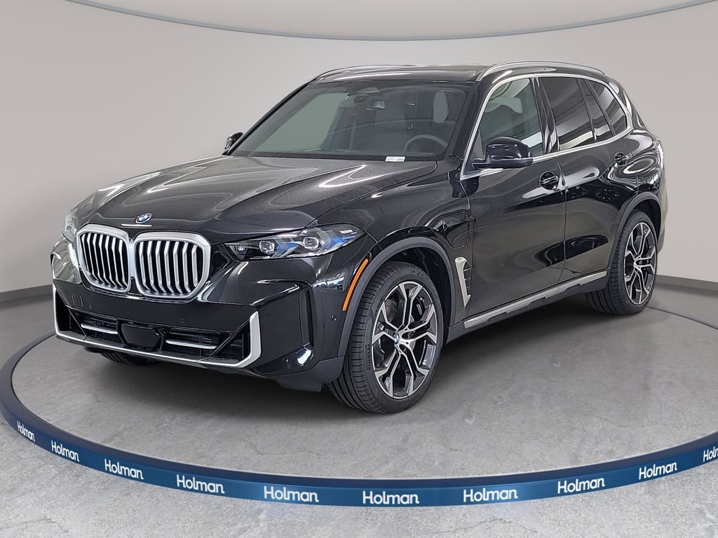 New 2026 Black Sapphire Metallic BMW xDrive50e image 1