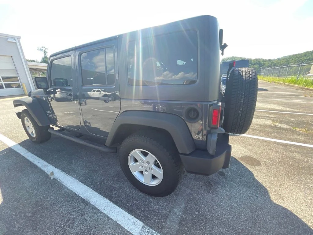 Used 2018 Black Jeep Unlimited Sport image 6