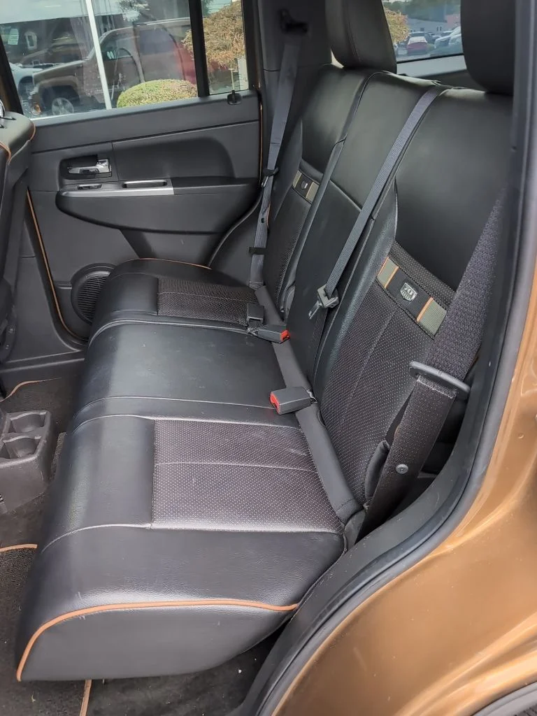 Used 2011 Brown Jeep Sport image 9