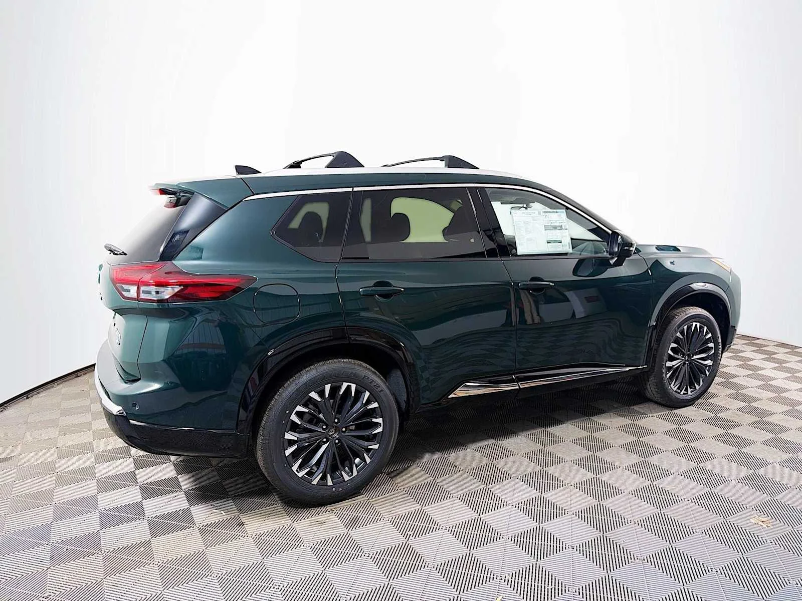 New 2026 Obsidian Green Nissan Platinum image 2