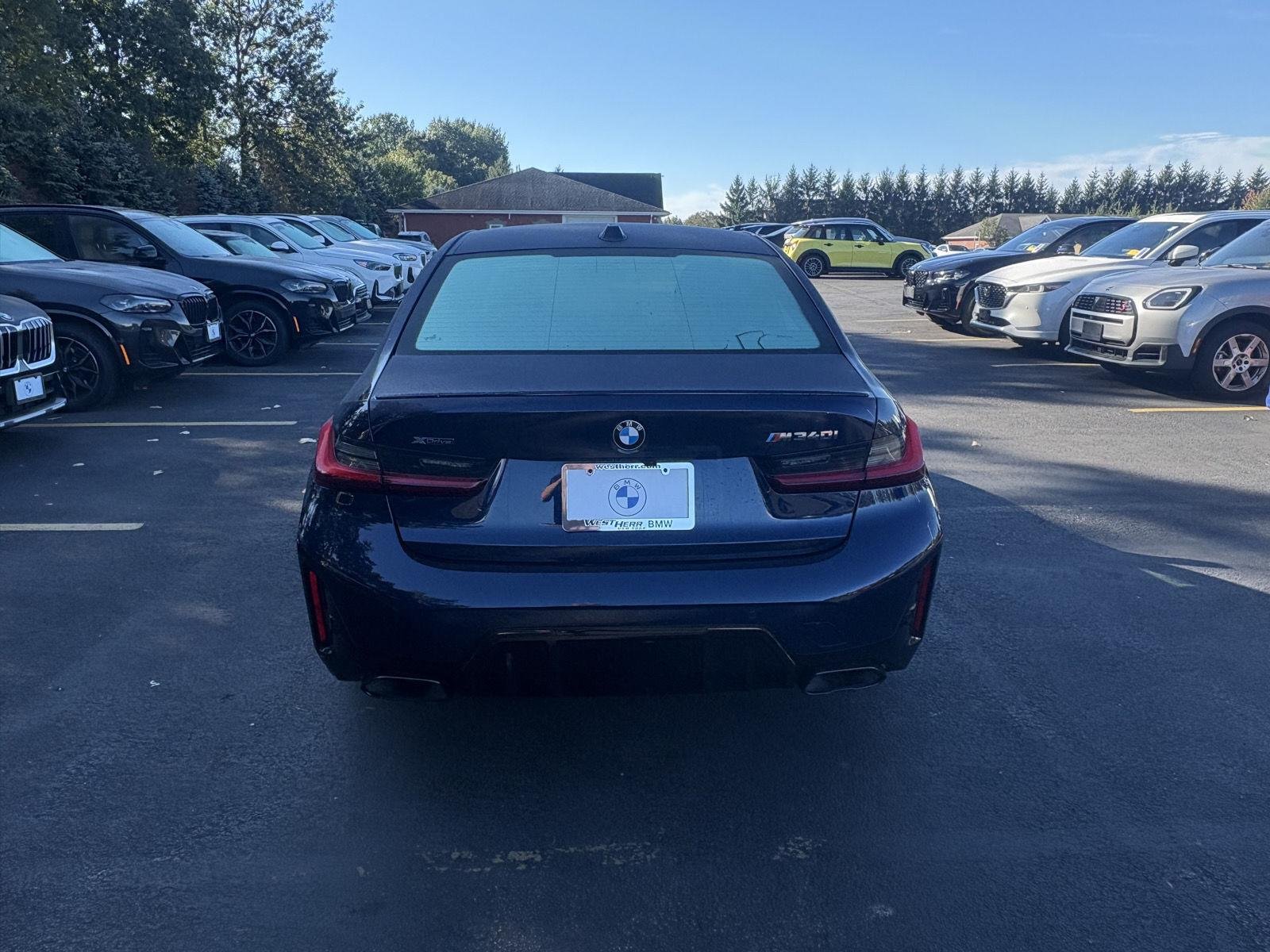 Used 2024 Tanzanite Blue II Metallic BMW M340i xDrive image 6