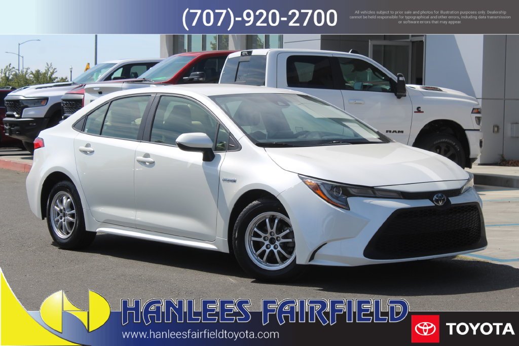 Used 2021 White Toyota LE image 1