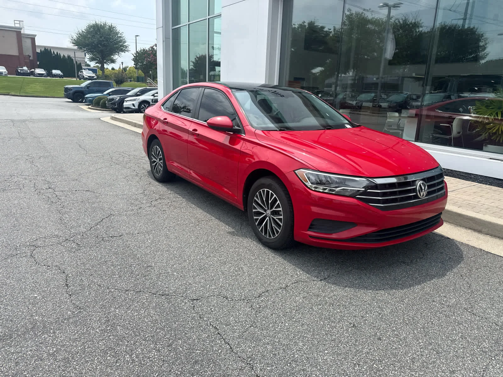Used 2021 Tornado Red Volkswagen SE image 2