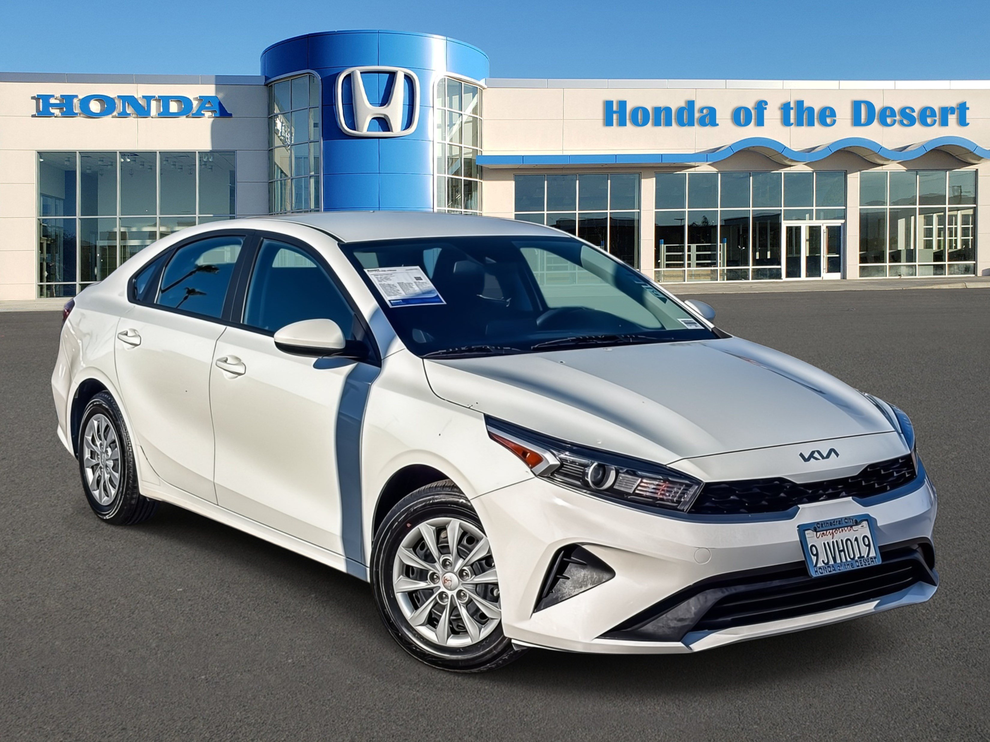 Used 2024 Clear White Kia LX image 1