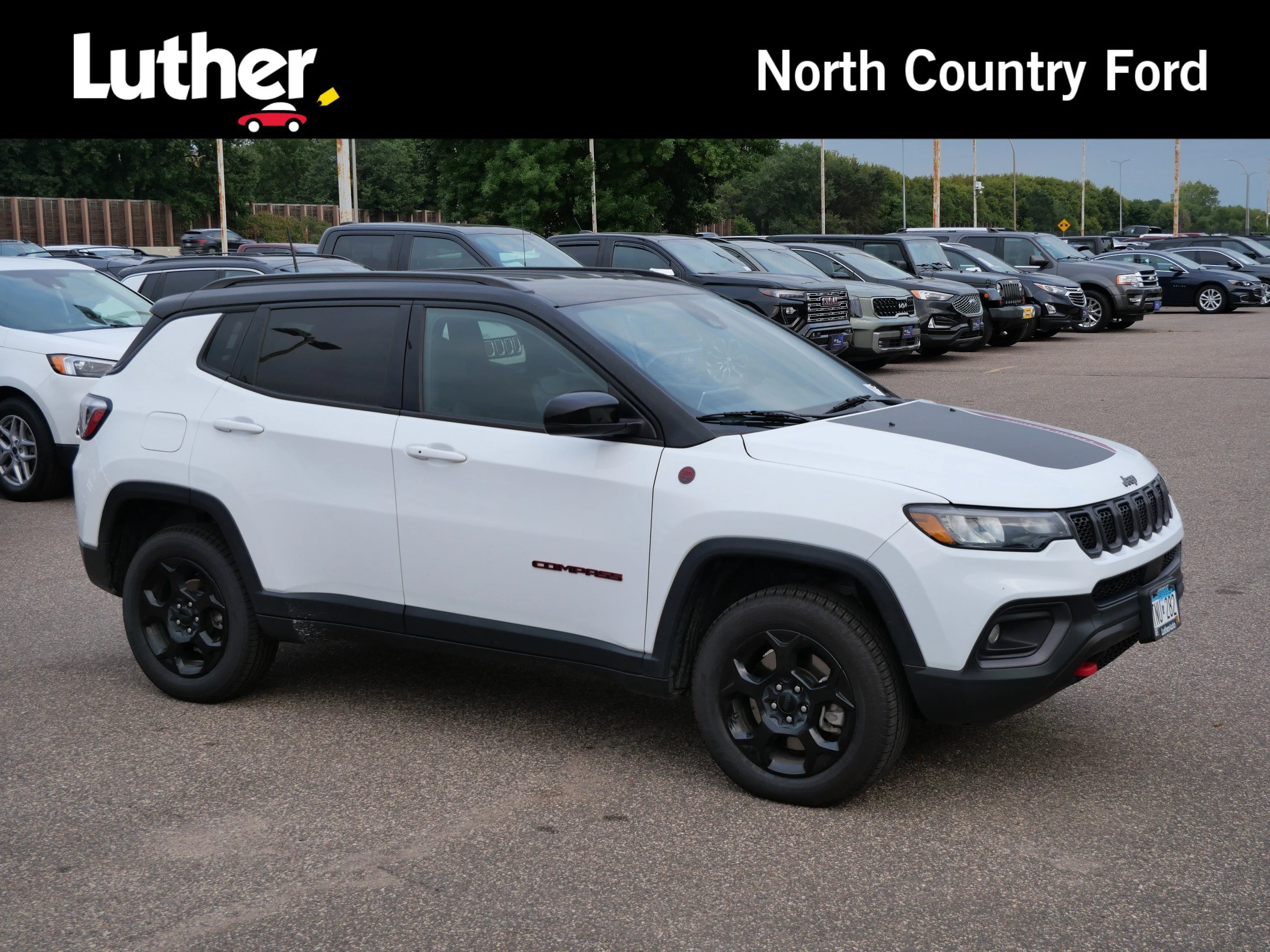 Used 2023 Bright White Clearcoat Jeep Trailhawk image 1