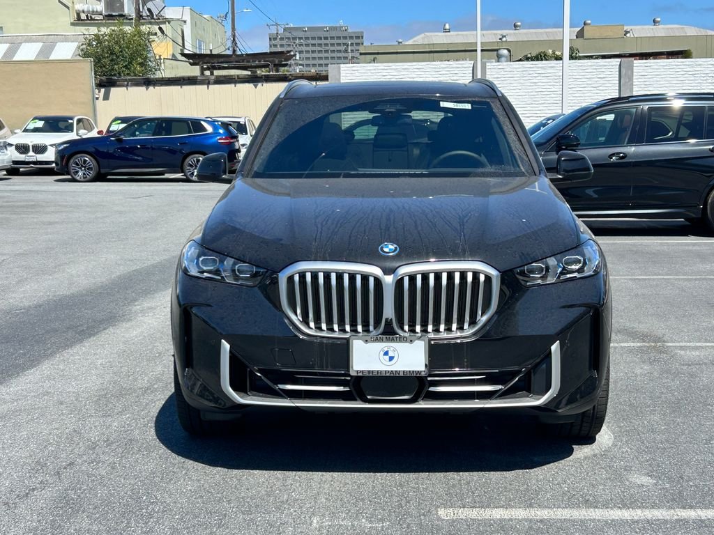 New 2026 Black Sapphire Metallic BMW xDrive50e image 8