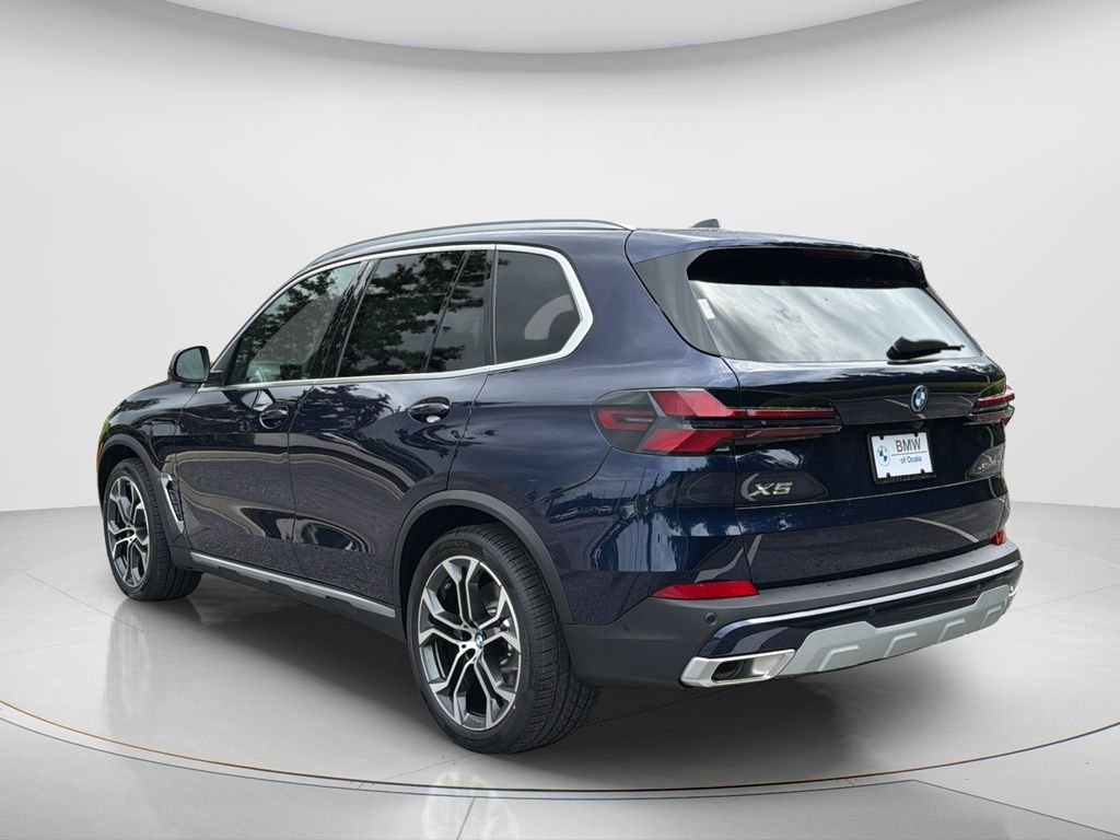 New 2026 Tanzanite Blue II Metallic BMW xDrive50e image 14