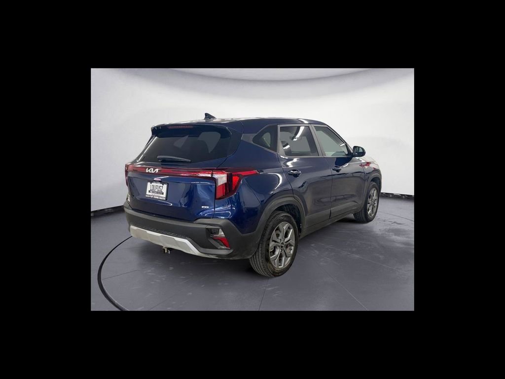 Used 2025 Blue Kia LX image 6