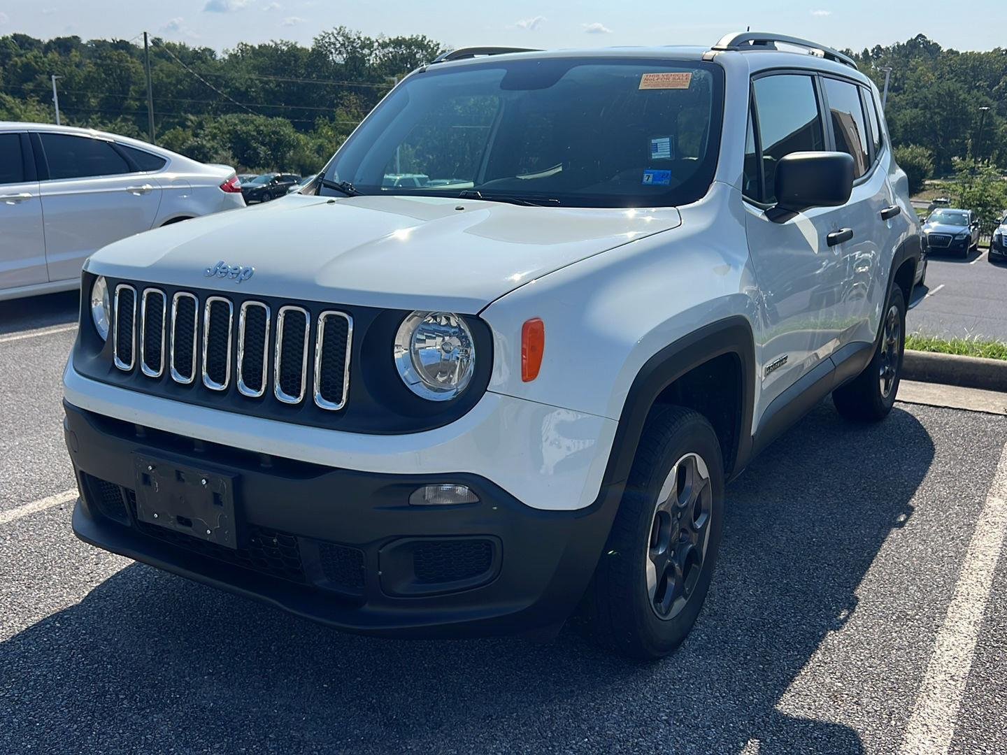 Used 2018 Alpine White Jeep Sport image 1