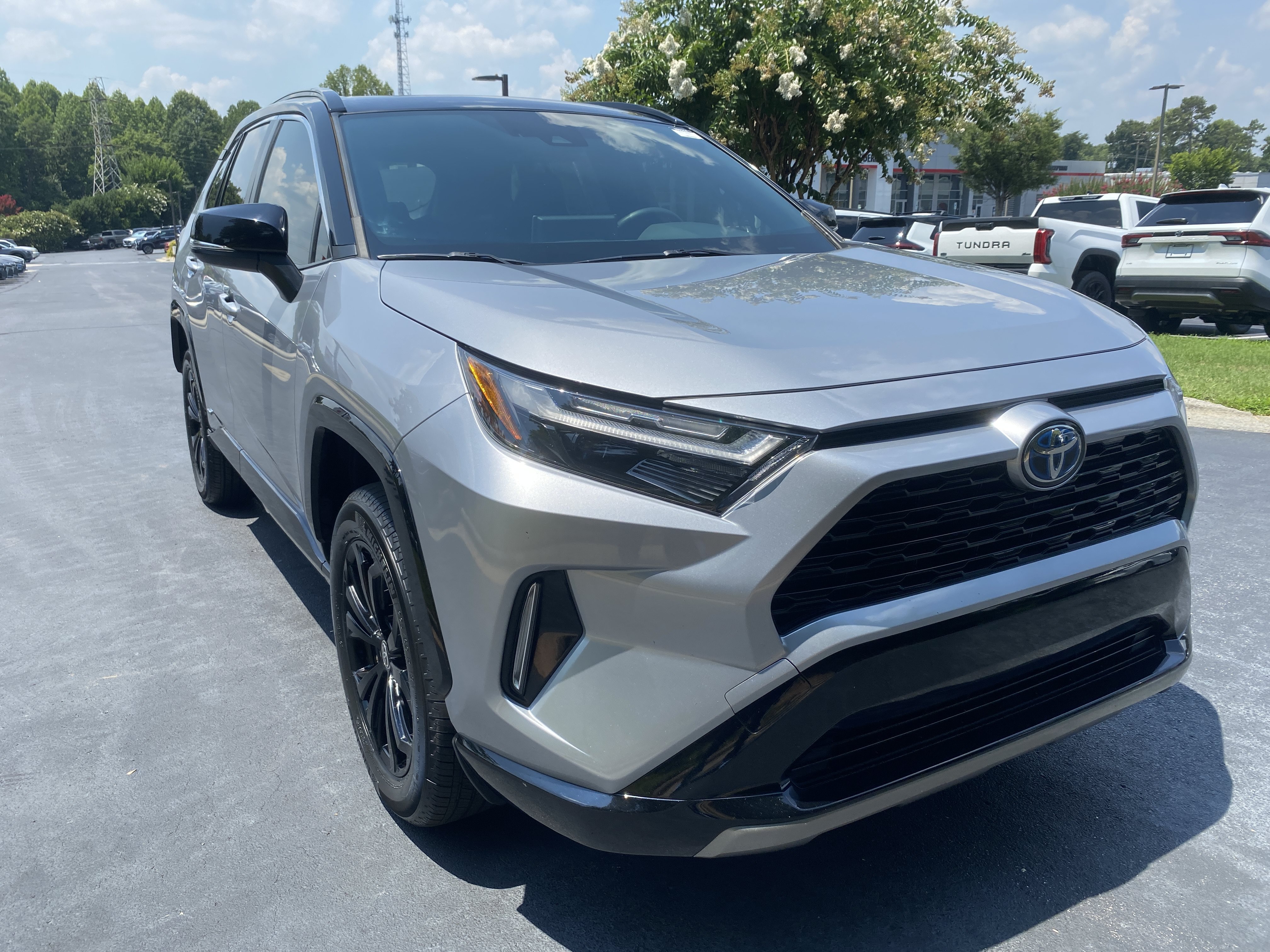 Used 2022 Silver Sky Metallic Toyota Hybrid XSE image 3