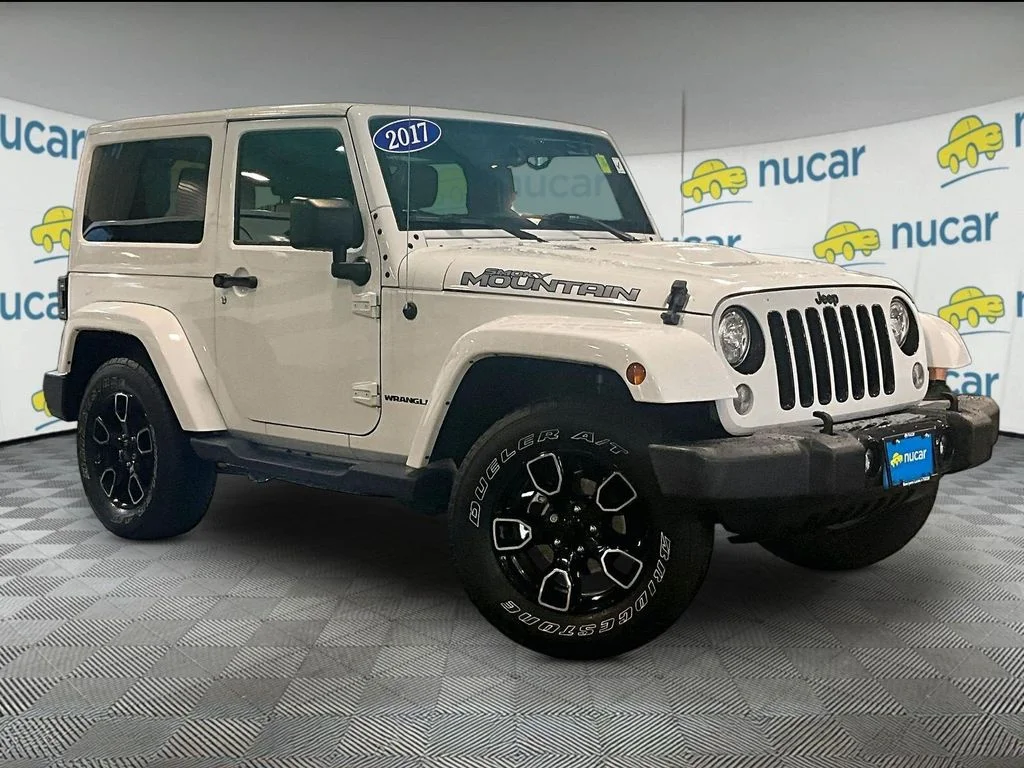 Used 2017 White Jeep Sahara image 1