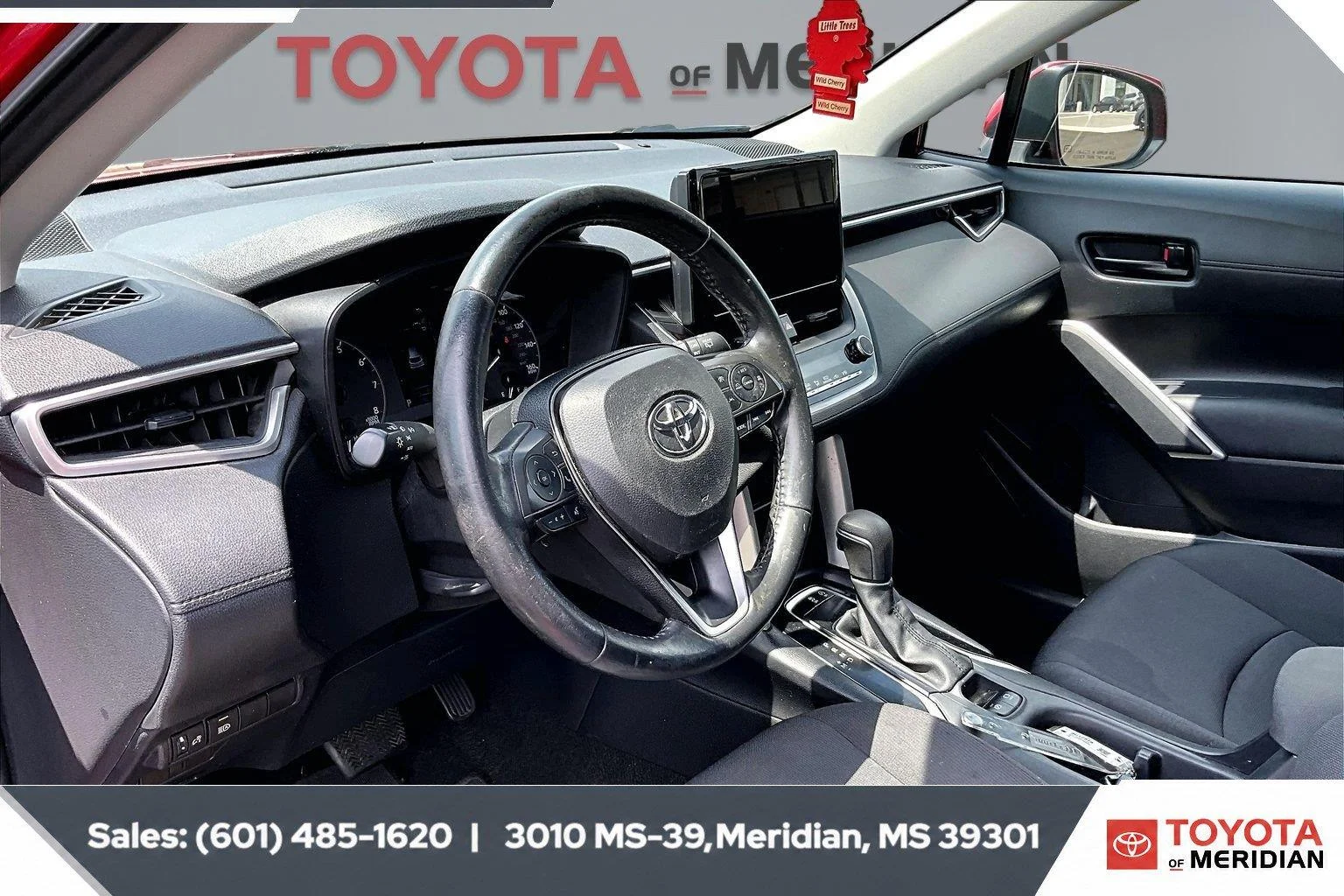Used 2023 Barcelona Red Metallic Toyota LE image 12