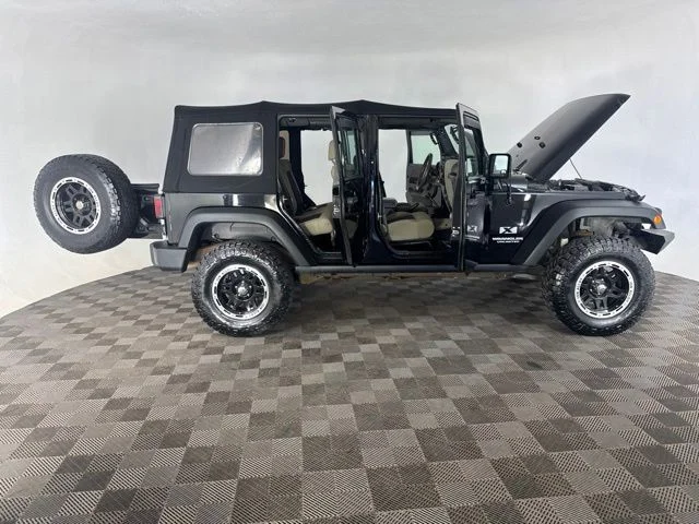 Used 2009 Black Jeep Unlimited X image 16
