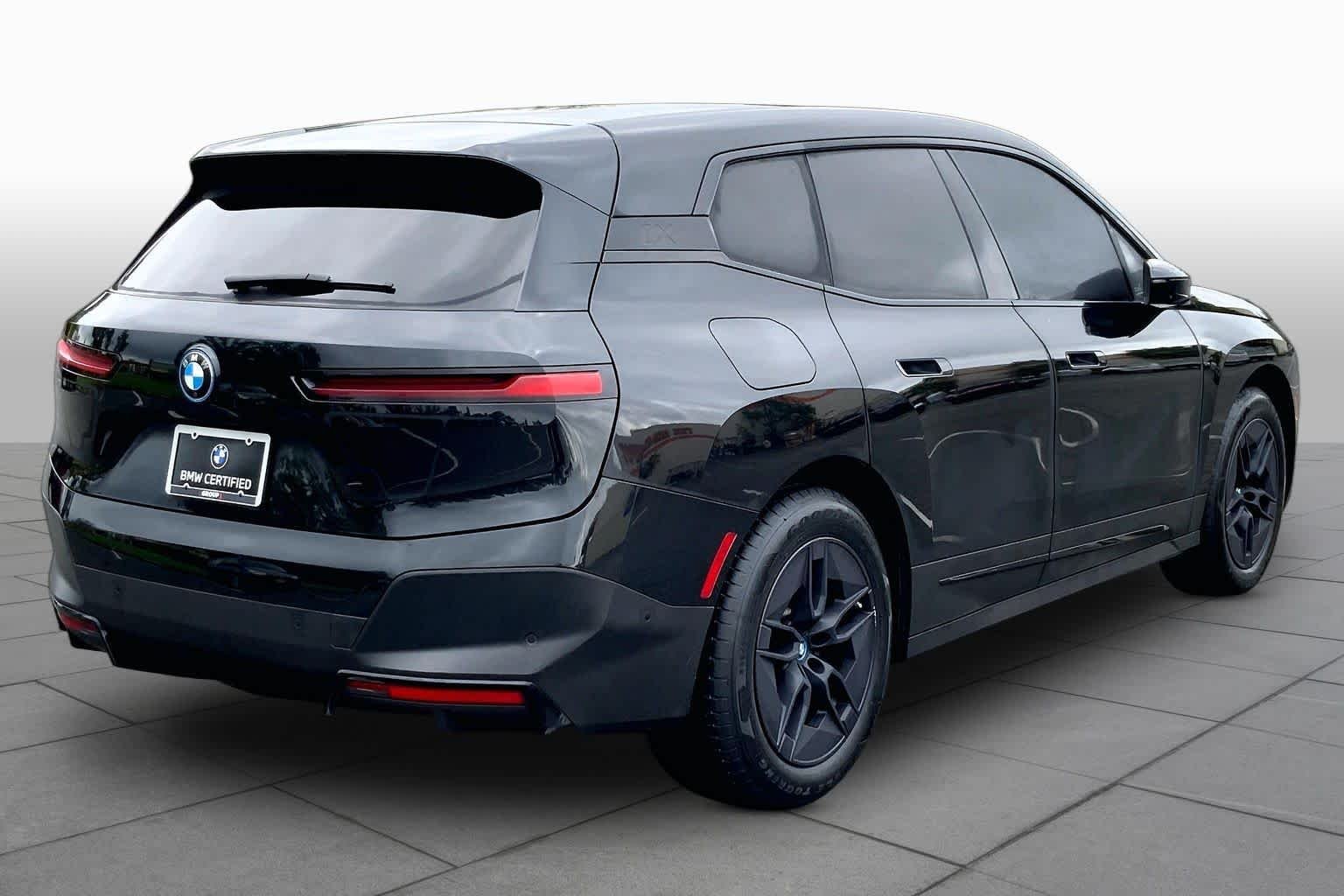 Used 2024 Black Sapphire Metallic BMW xDrive50 image 11