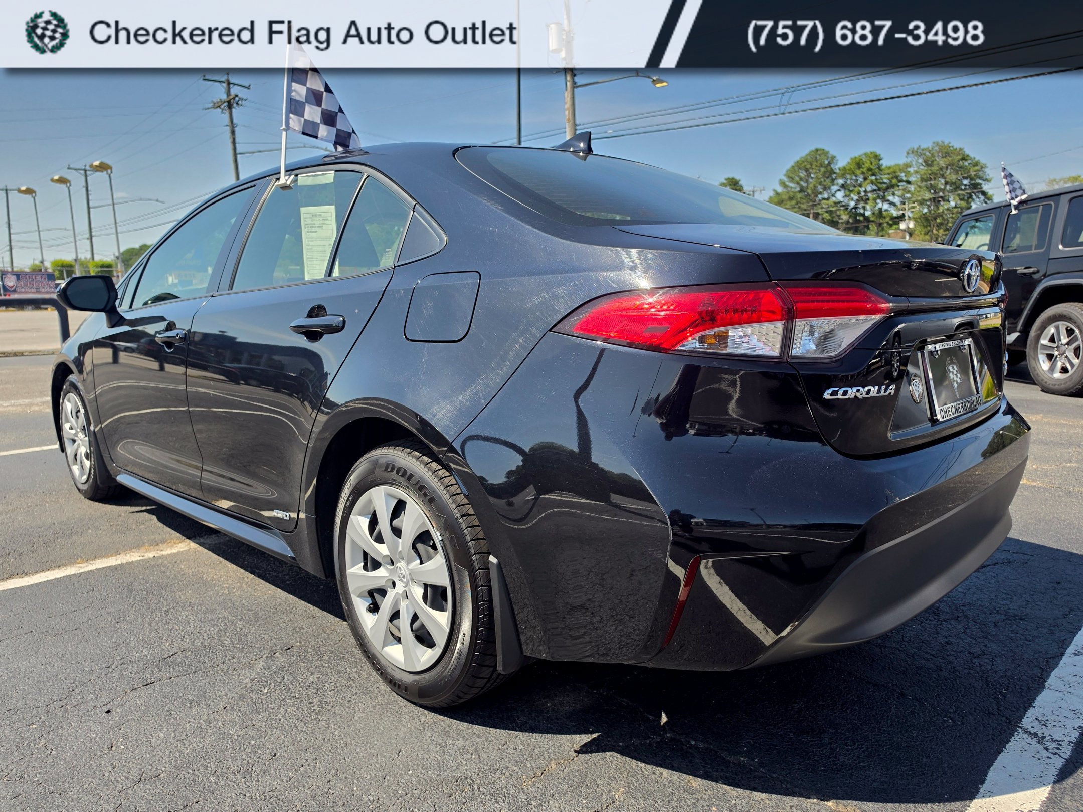 Used 2023 Midnight Black Metallic Toyota LE image 3