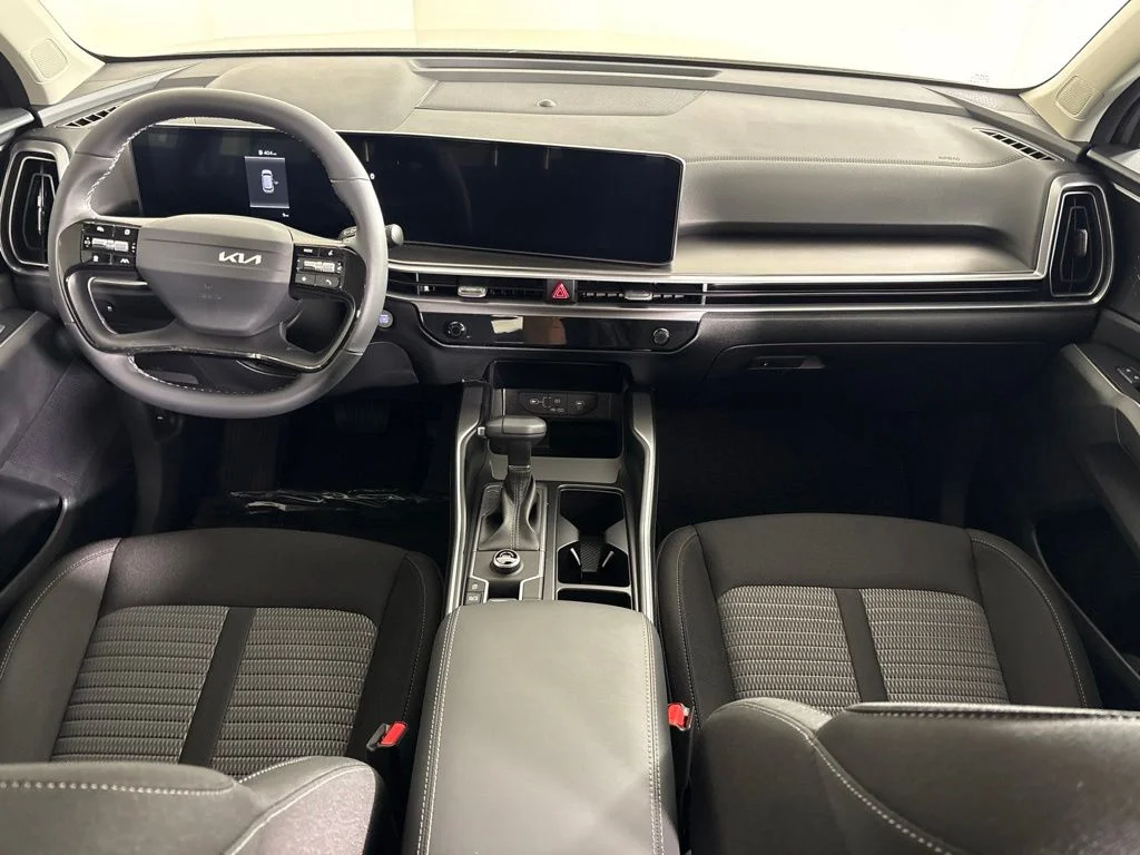 New 2026 Ivory Silver Kia LX image 13