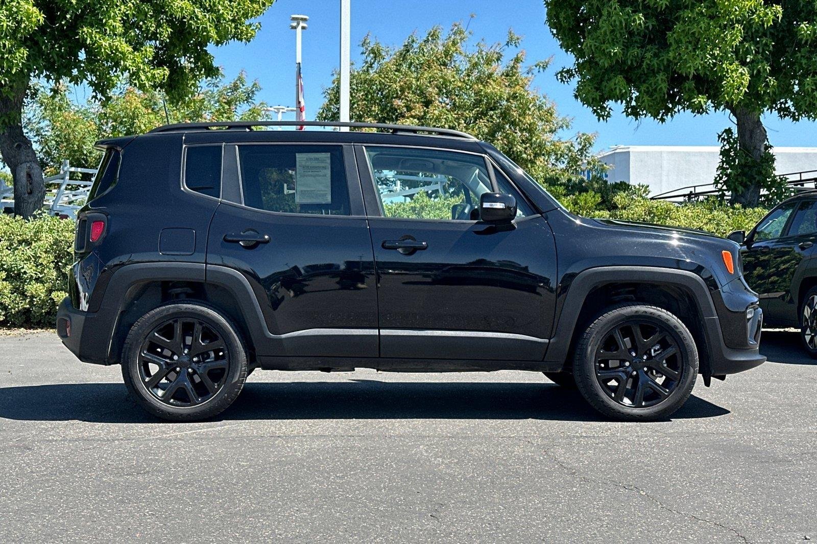 Used 2023 Black Clearcoat Jeep Altitude image 3