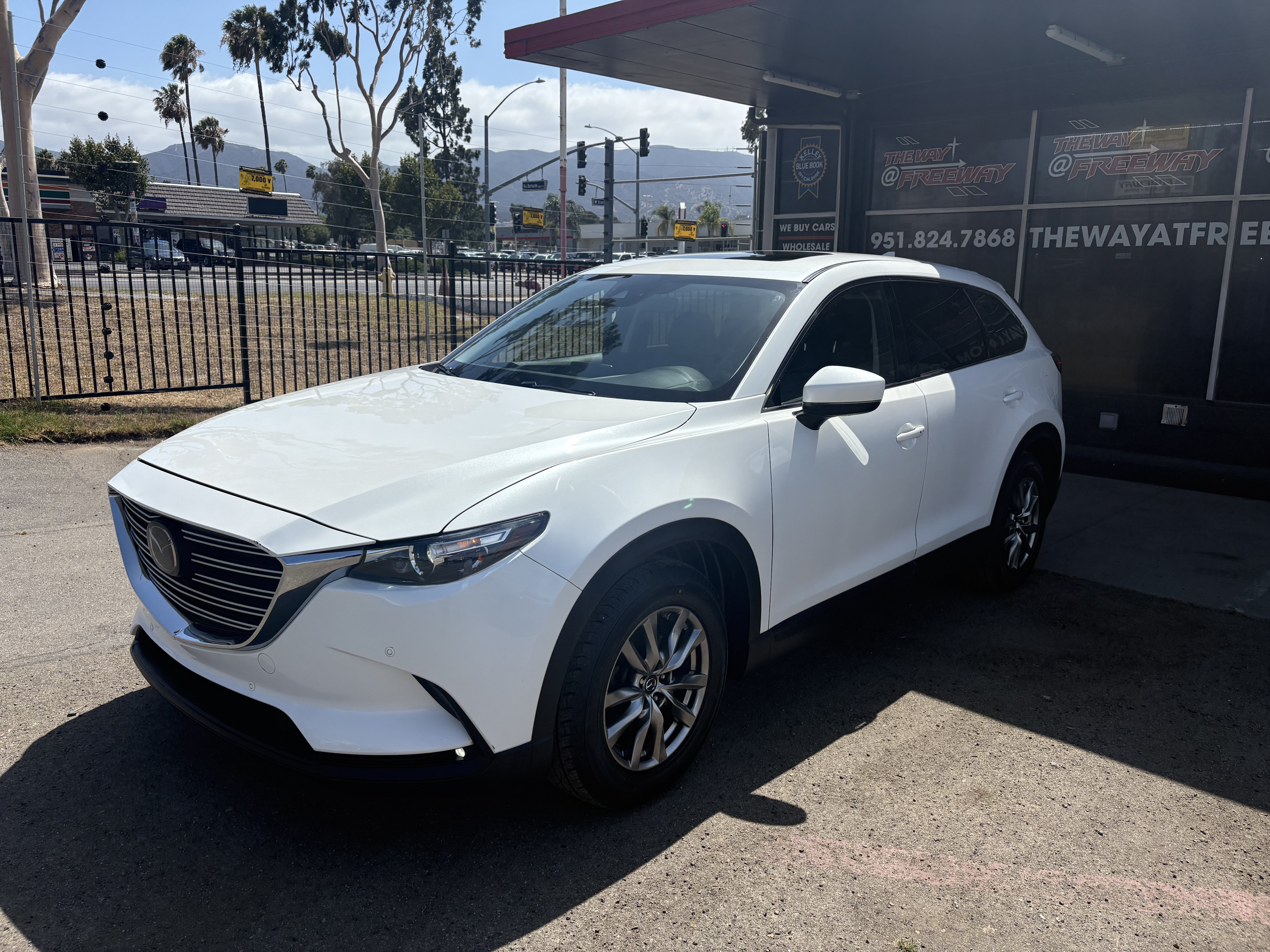 Used 2019 Snowflake White Pearl Mica Mazda Touring image 1