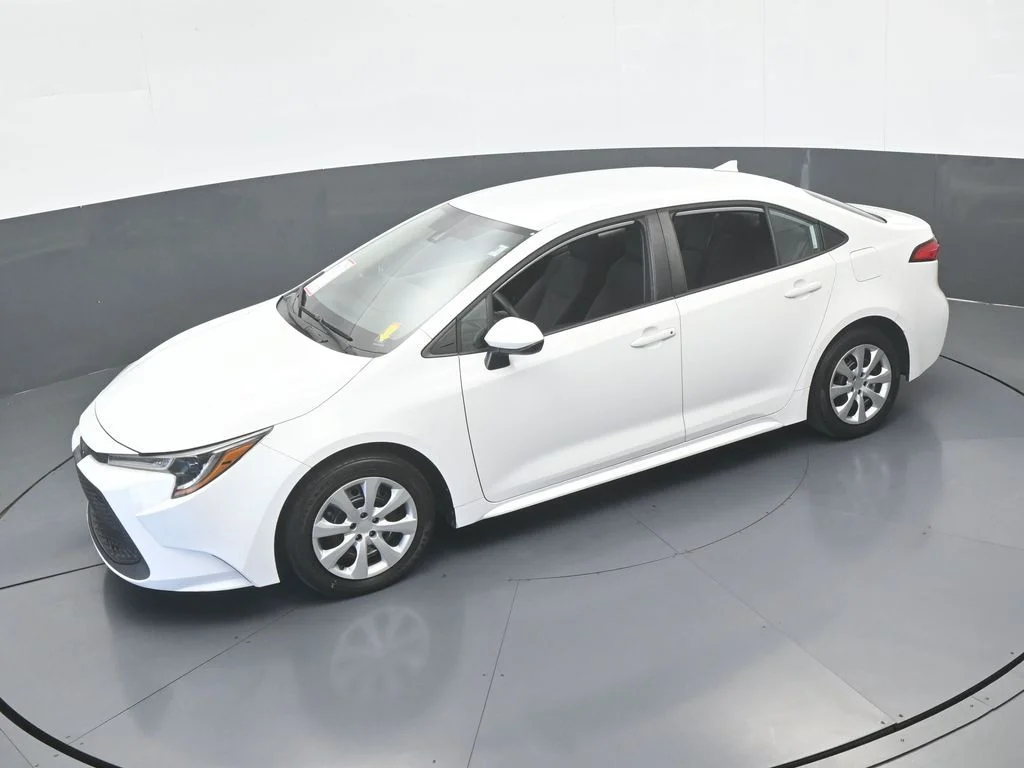 Used 2021 Super White Toyota LE image 36