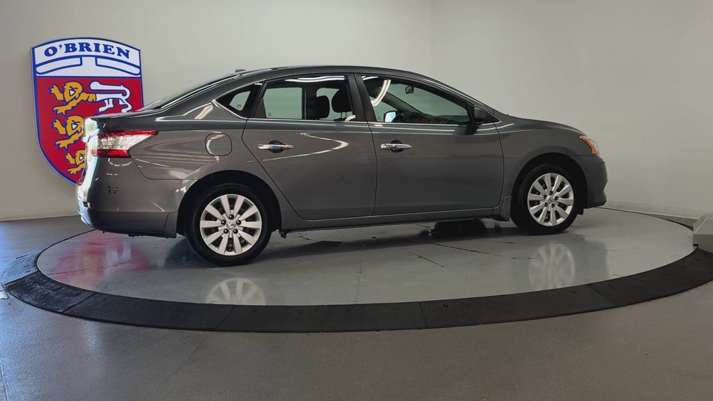 Used 2015 Gun Metallic Nissan SV image 4