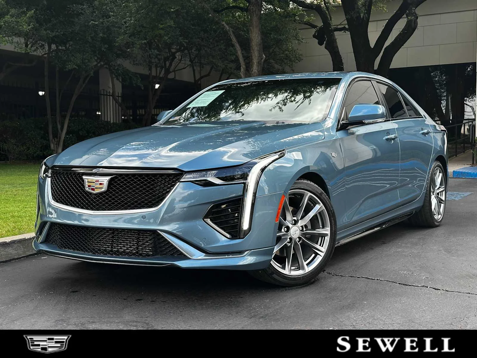 Used 2024 Midnight Steel Metallic Cadillac Sport image 1