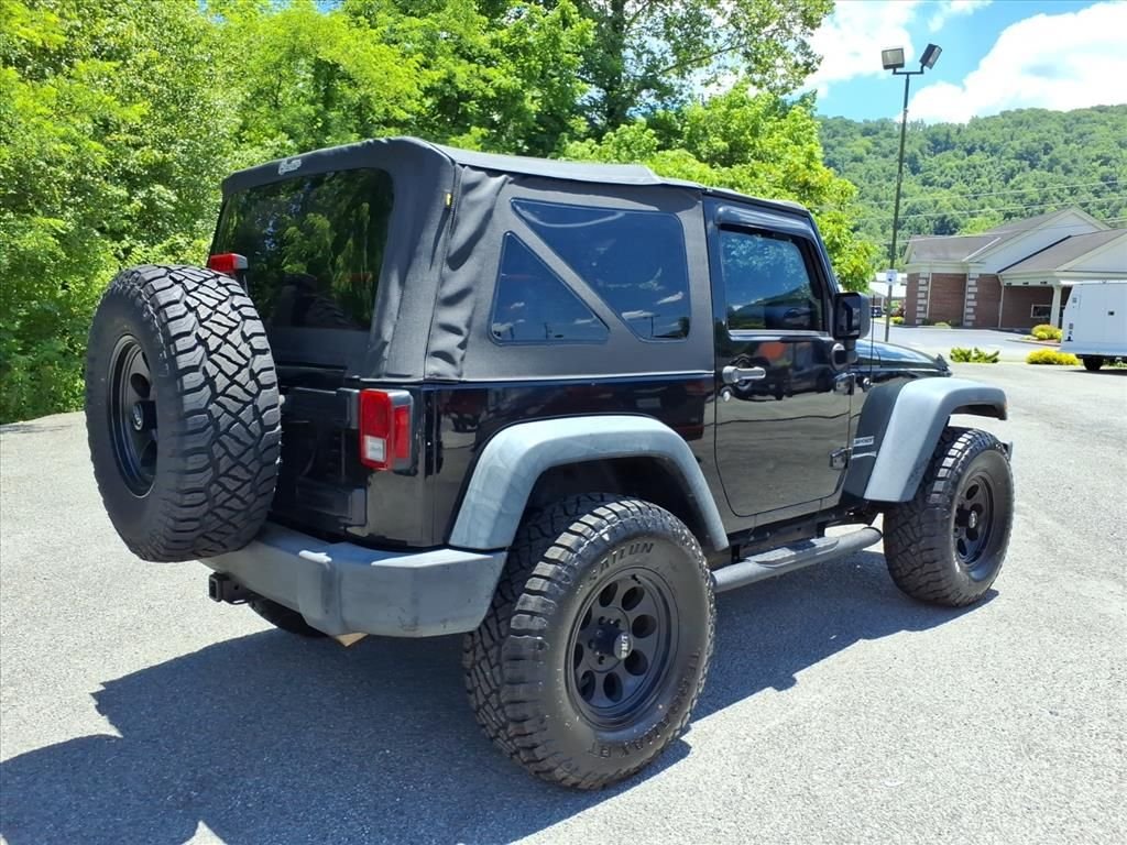 Used 2013 Black Jeep Sport image 6