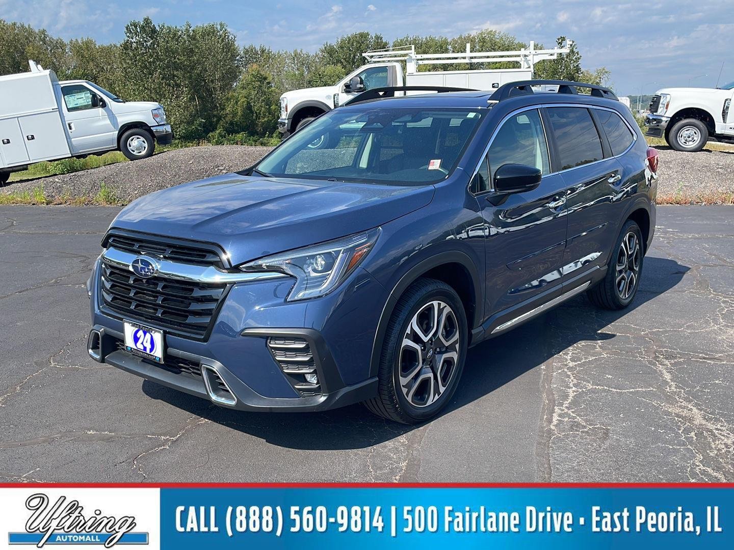 Used 2024 Cosmic Blue Pearl Subaru Touring image 1