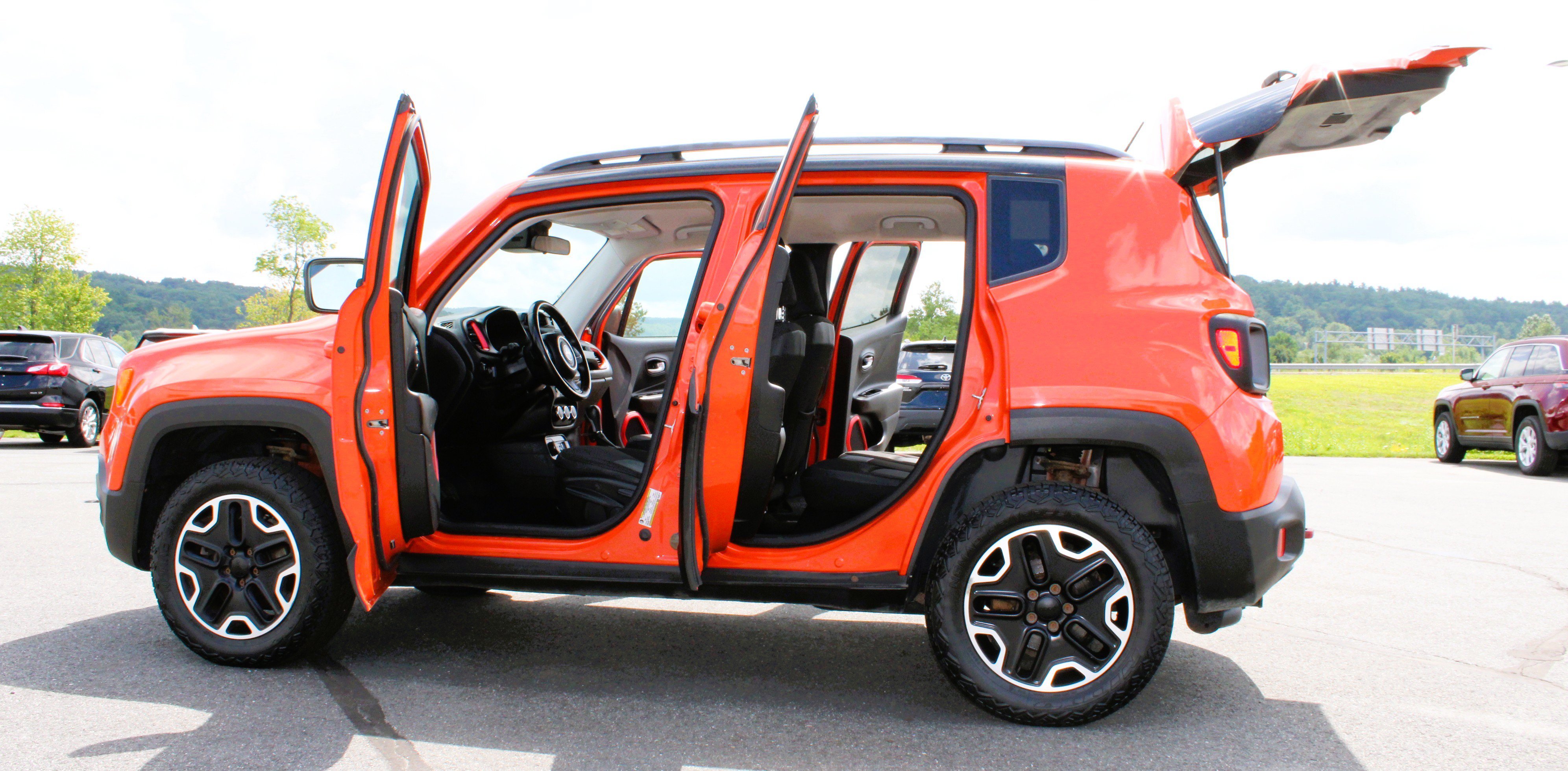 Used 2015 Omaha Orange Jeep Trailhawk image 15