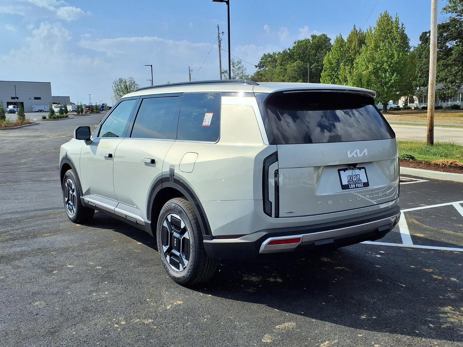New 2027 Ivory Silver Kia EX image 16