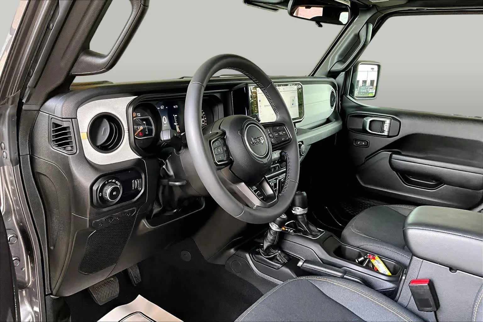Used 2025 Granite Crystal Metallic Clearcoat Jeep Sport S image 17