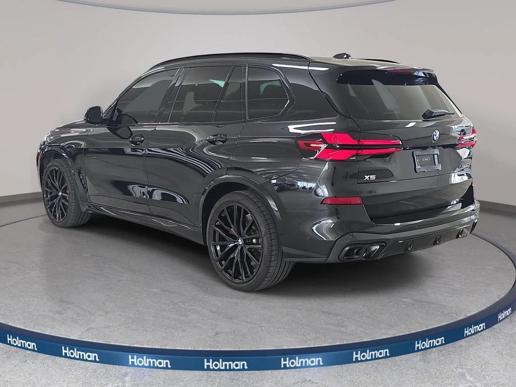 Used 2025 Black Sapphire Metallic BMW M60i image 9