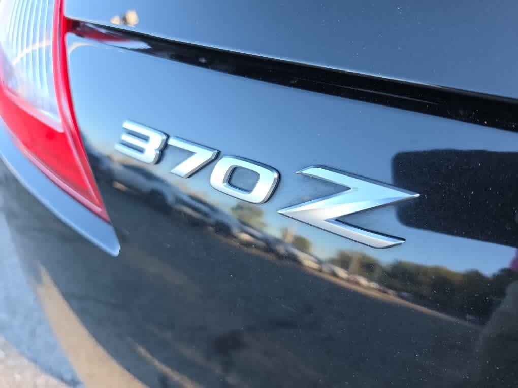 Used 2016 Magnetic Black Nissan Sport Tech image 12