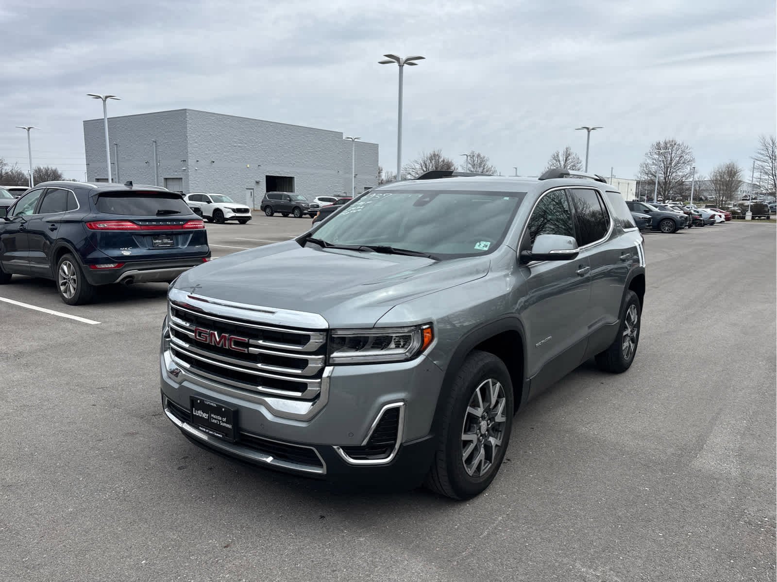 Used 2023 GMC Acadia SLE with VIN 1GKKNRL45PZ176937 for sale in Kansas City