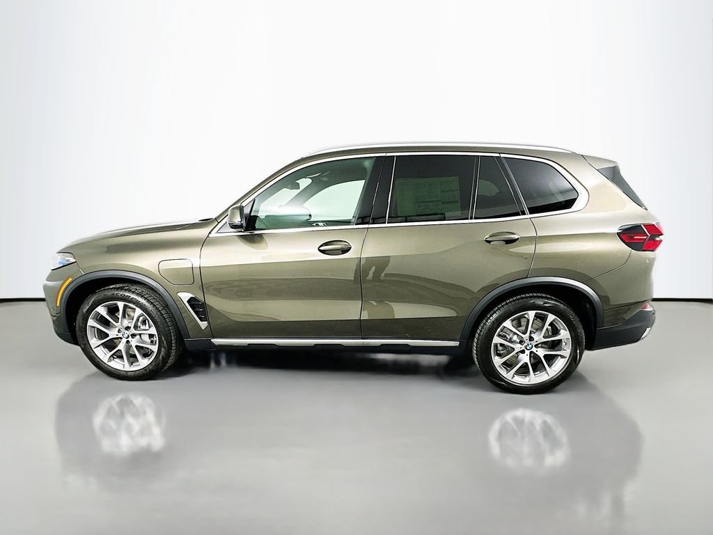 New 2026 Manhattan Green Metallic BMW xDrive50e image 8