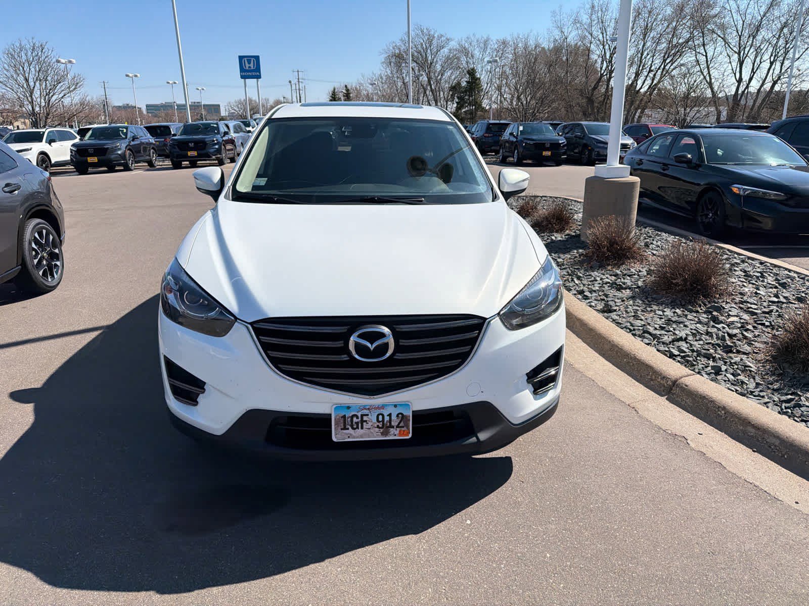 Used 2016 Mazda CX-5 Touring with VIN JM3KE4CY8G0882586 for sale in Hopkins, MN