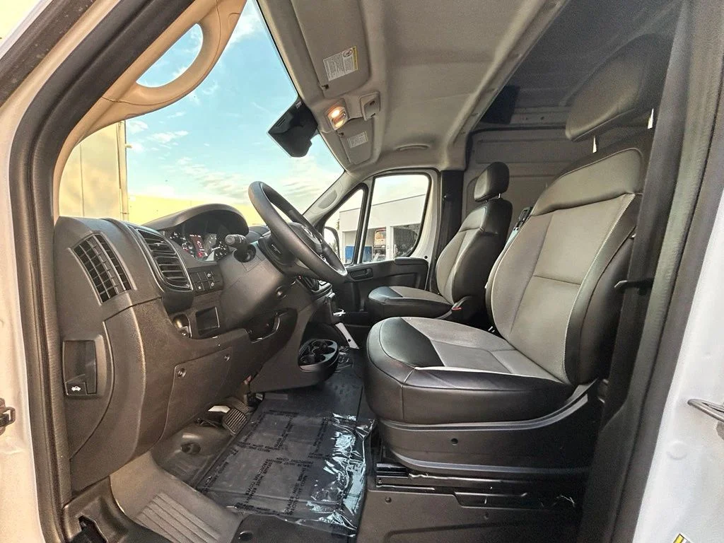 Used 2025 Bright White Clearcoat Ram High Roof image 11