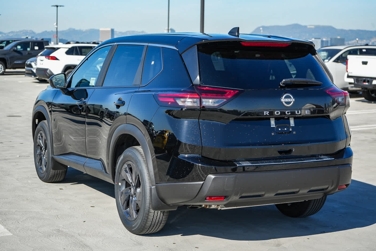 New 2026 Super Black Nissan SV image 8