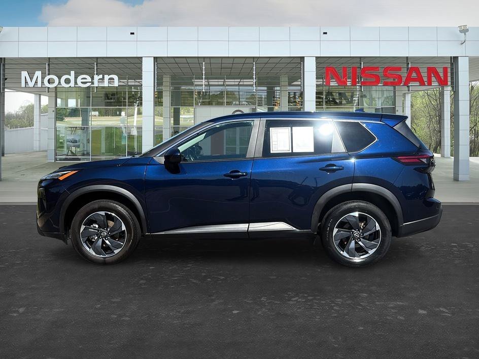 Used 2025 Deep Ocean Blue Pearl Nissan SV image 2