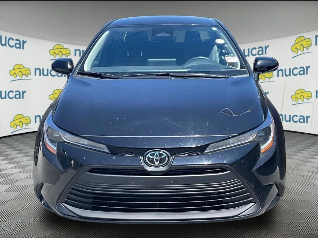 Used 2024 Black Toyota LE image 2