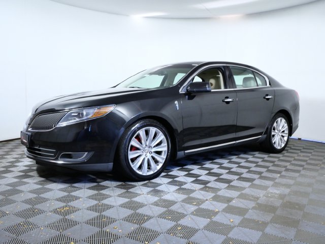 Used 2013 Lincoln MKS Base with VIN 1LNHL9FTXDG607760 for sale in Apple Valley, Minnesota