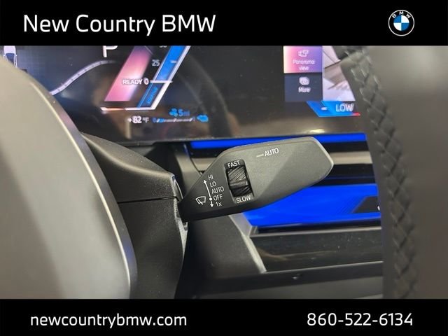 New 2026 Mineral White Metallic BMW 550e xDrive image 15